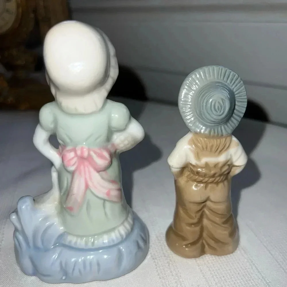 Vintage Porcelain Figurines Woman In Dress With Duck Boy Hands In Pockets